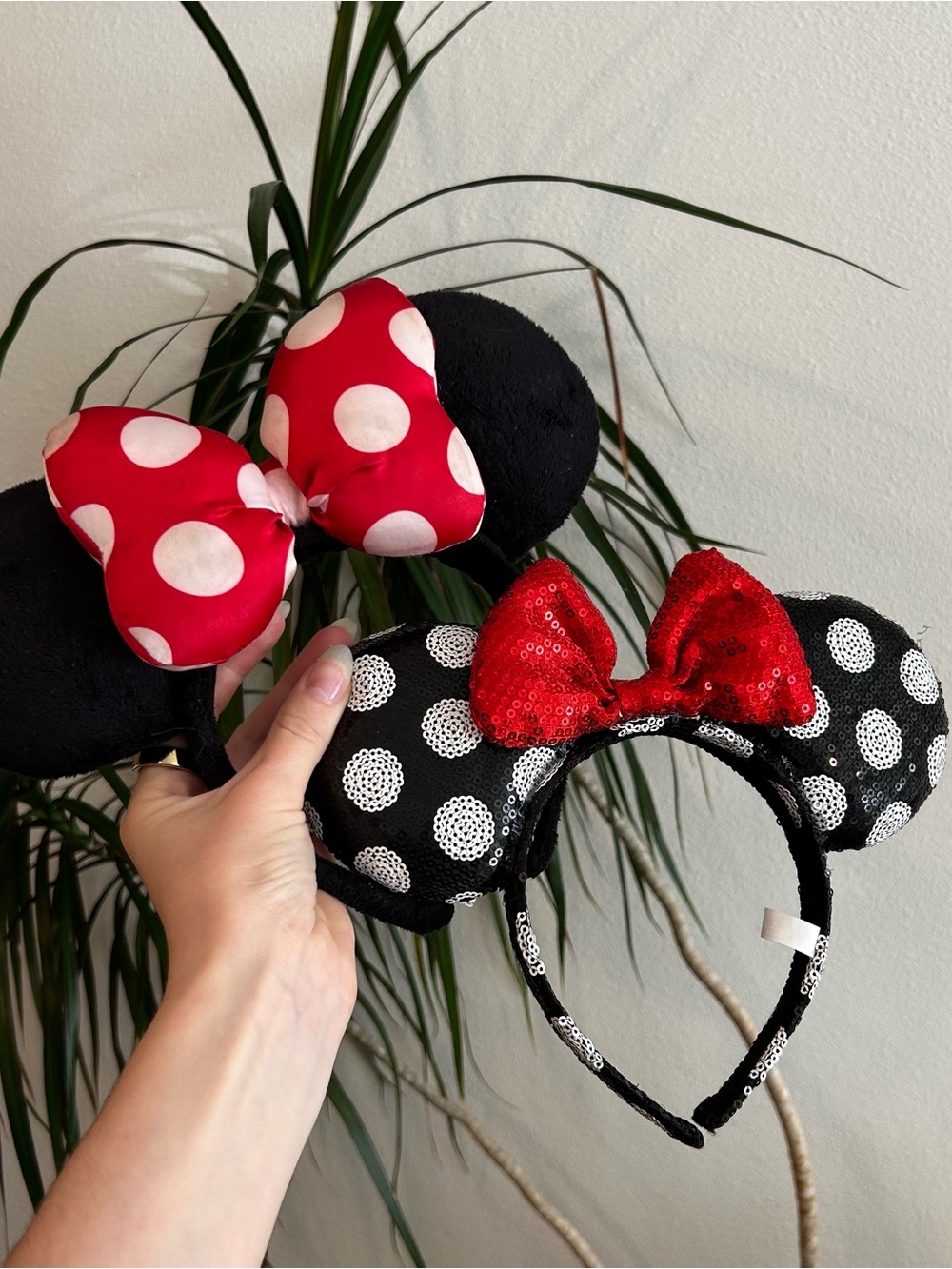Set of two Disney sequence Minnie Mouse ears
The satin ones have some stains